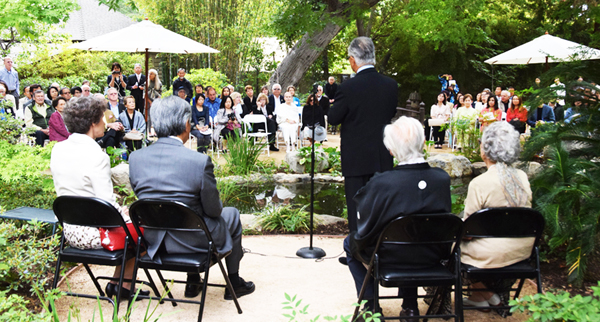 Over 100 guests honor a sapling planting ceremony at Storrier Stearn garden on May 8. (Photo by Richard Fukuhara) 
