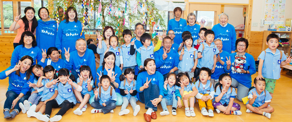 Members of the Grateful Crane Ensemble's 2016 Goodwill Tour to Tohoku performed for these children at the Ohisama Hoikuen in Kesennuma, Japan.  Grateful Crane will be singing songs from the tour at a free concert in Little Tokyo on November 5th.  (Photo by Michael Palma.) 